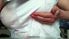 Busty milf wets t-shirt without bra, orgasms from pierced nipples