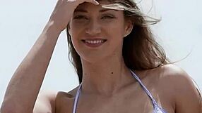 Busty European teen Mila Azul reveals big tits after striptease