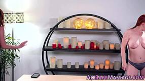 Redhead masseuse skillfully rims a gorgeous babe in high-definition massage session