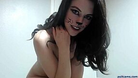 watch this teen in her slutty pussy cat outfit fingering herself on cam