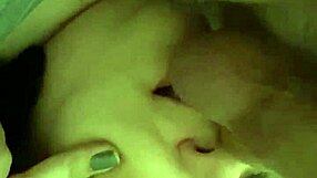 Laying Down Licking Balls with Tongue in Close Up