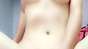 Asian babe masturbating passionately in private