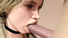 blond girl giving suggestive blowjob to big white monster cock