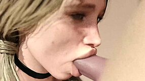 blond girl giving suggestive blowjob to big white monster cock
