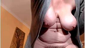 Webcam mature lady shows off big tits and hairy body in solo session