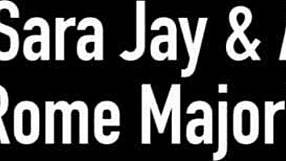 Sara Jay, the busty MILF, rides big black cocks in a group scene.