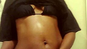 naej ae seduces with striptease before squirting