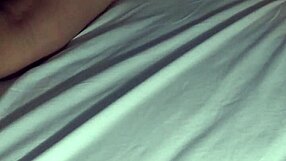 therapist gives relaxing massage to wife at home