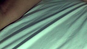 therapist gives relaxing massage to wife at home