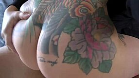 Bella scorpion shakes her big tatted ass while spreading