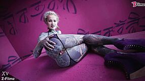 Goth punk hints at anal pleasures with finger and buttplug