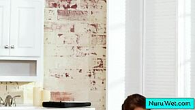 Busty teen masseuse applies nuru gel and rubs client