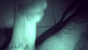 Watch this tattooed guy stroke his cock late at night!