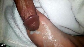 Cumshot Landing on Oiled Feet in Glamorous Scene