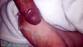 Cumshot Landing on Oiled Feet in Glamorous Scene