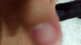 wife playfully using dildo at home