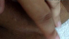 wife playfully using dildo at home