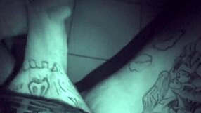 Watch this tattooed guy stroke his cock late at night!