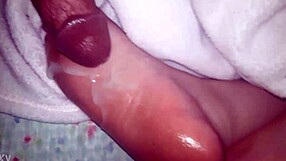 Cumshot Landing on Oiled Feet in Glamorous Scene