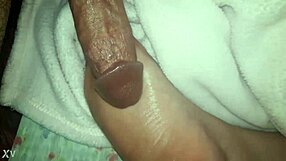 Cumshot Landing on Oiled Feet in Glamorous Scene