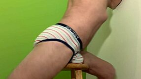 Wow, stretch that pelvic floor in striped briefs on stool!