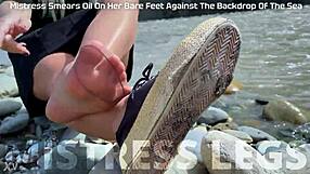 Goddess in Tan Nylons Teases with Cute Soles by Riverside