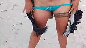 Latina exposes tits and ass on mexican beach