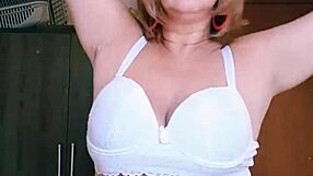 lingerie milf flaunts big tits and pussy lips in solo tease