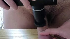 Inserting silicone toy into dick and pounding with massager intensely