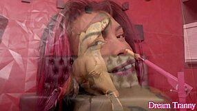 Sexy tattooed tranny Bianca Berbare intensely fucks her ass with machine.