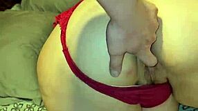 wearing a red thong that shows off my big cheeks and curves