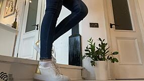 Milf brunette shows off feet in sneakers for fetish