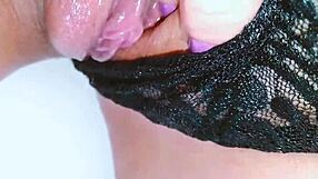 Naughty babe caught fingering her shaved pink in a public restroom on hidden cam