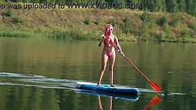 Skinny Slut in Pink Micro Bikini Shows Off in Public Garden