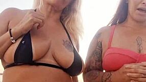 Talking dirty at the beach with my naughty friend, then we took that newbie's virginity