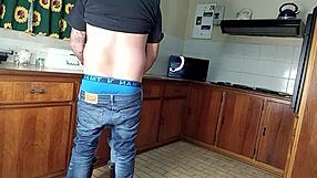 Quickie kitchen fuck with standing sex gets her shaved pussy dripping