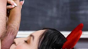 Asian teen spinner rides in classroom by chalkboard