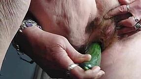 German Granny Stuffs Her Hairy Pussy with Cucumber