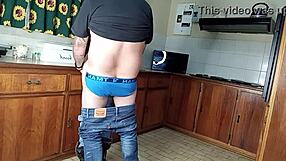 Quickie kitchen fuck with standing sex gets her shaved pussy dripping