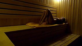 I caught this girl fingering herself in the sauna at night.