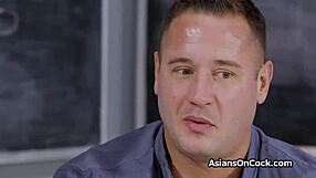 Asian teen spinner rides in classroom by chalkboard