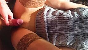 cute girl in sexy sweater enjoys homemade fun