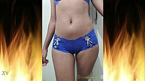 Beautiful brunette flashes in blue lingerie homemade trailer