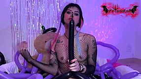 Emo girl hotly playing with balloons