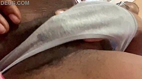 Black babe chills while rubbing her pussy.