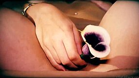 petite teen candice, are you masturbating with that flower on your shaved pussy?