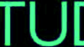 Blonde college student studies in her uniform