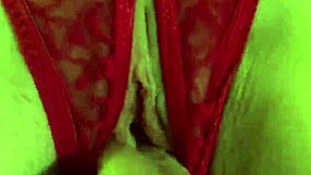 Shaved pussy in wet red thongs gets fingered