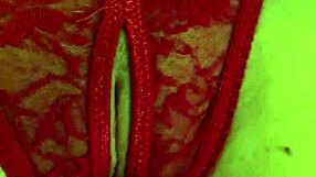 Shaved pussy in wet red thongs gets fingered