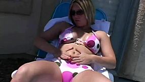 paige applies lotion outdoors in the sunshine